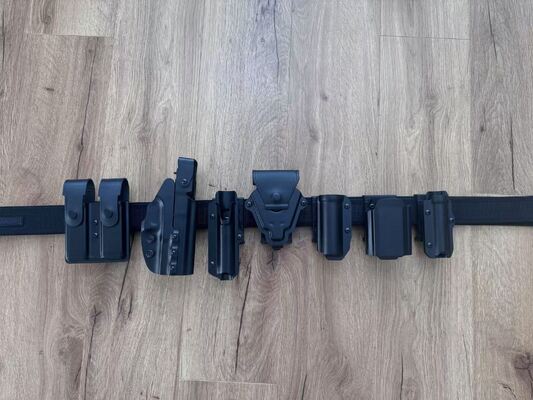 Duty Belt Offering Custom PVC Case Options for Pistol Mag Frame Tear Gas Flashlight Handcuff Baton and PTT with Inner Belt